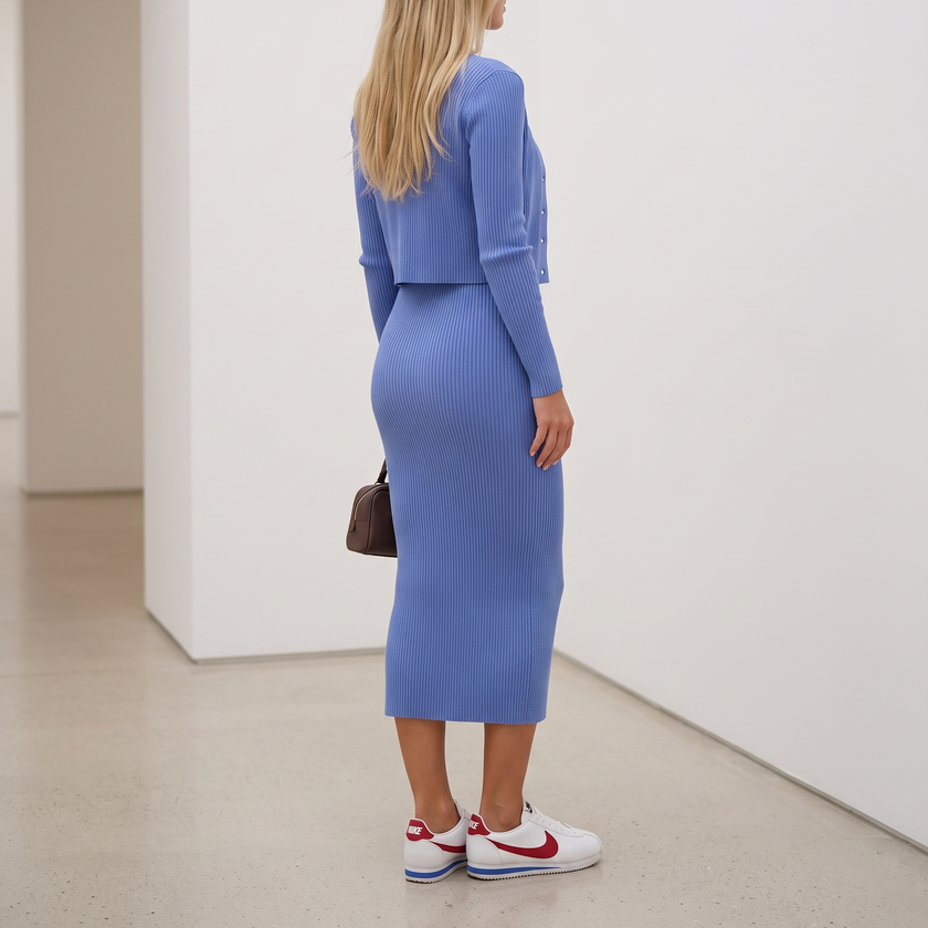 Matching two piece set with a ribbed midi dress and cropped button front cardigan