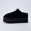 Huggy Shearling Platform Clogs