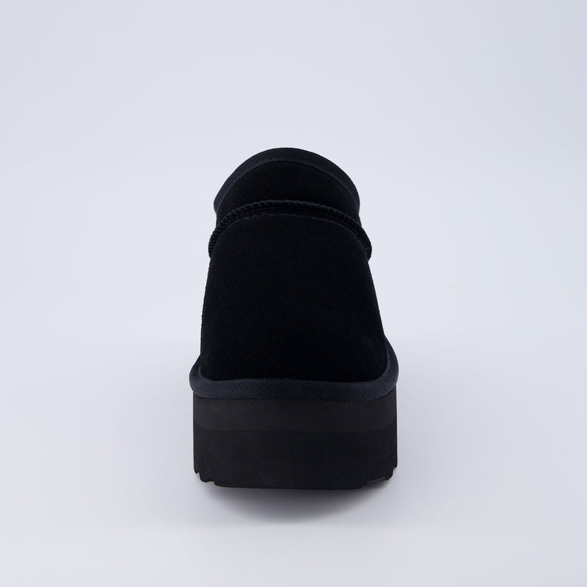 Huggy Shearling Platform Clogs