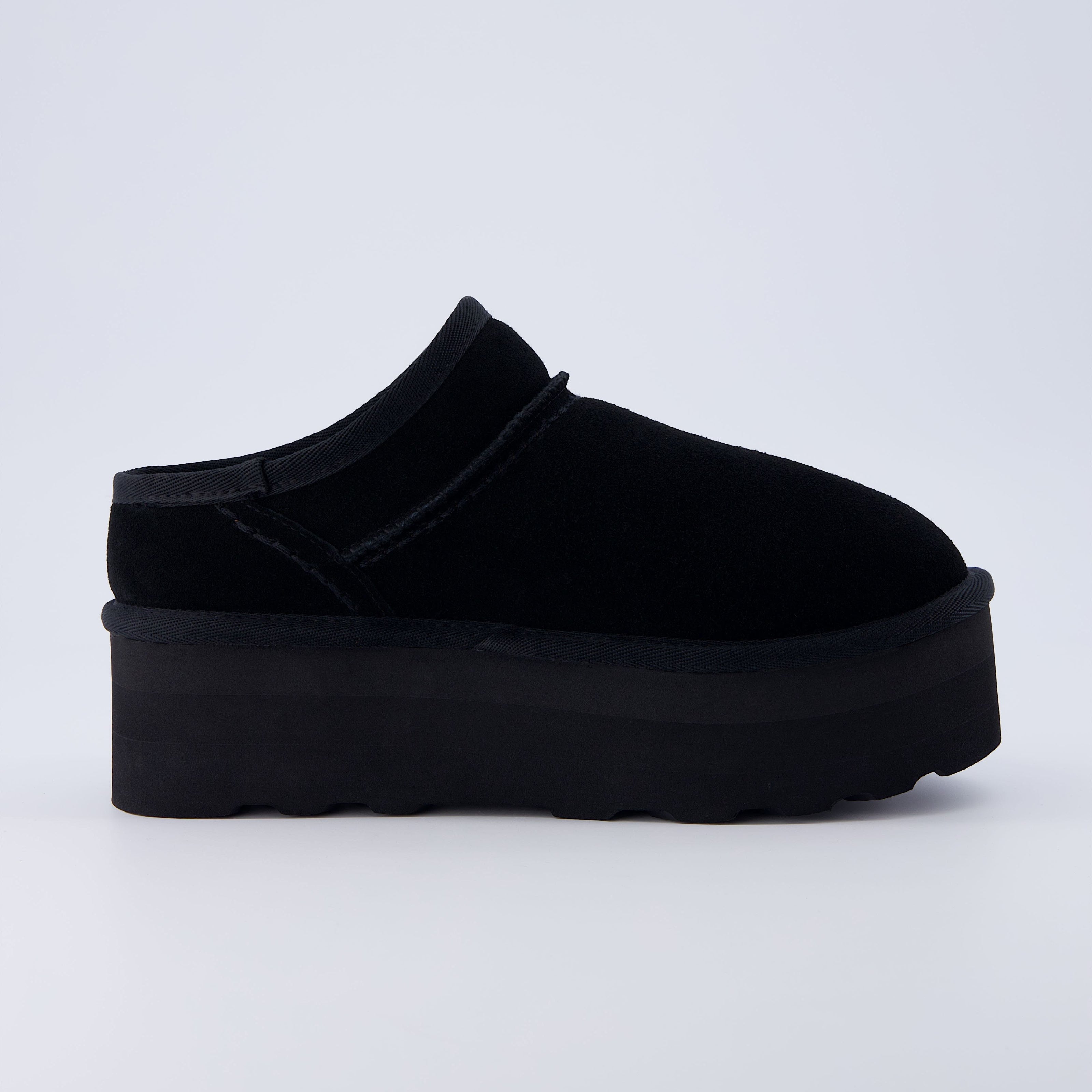 Huggy Shearling Platform Clogs