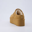 Huggy Shearling Platform Clogs