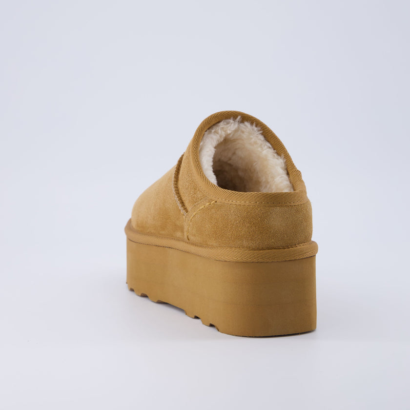 Huggy Shearling Platform Clogs