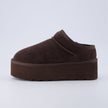 Huggy Shearling Platform Clogs