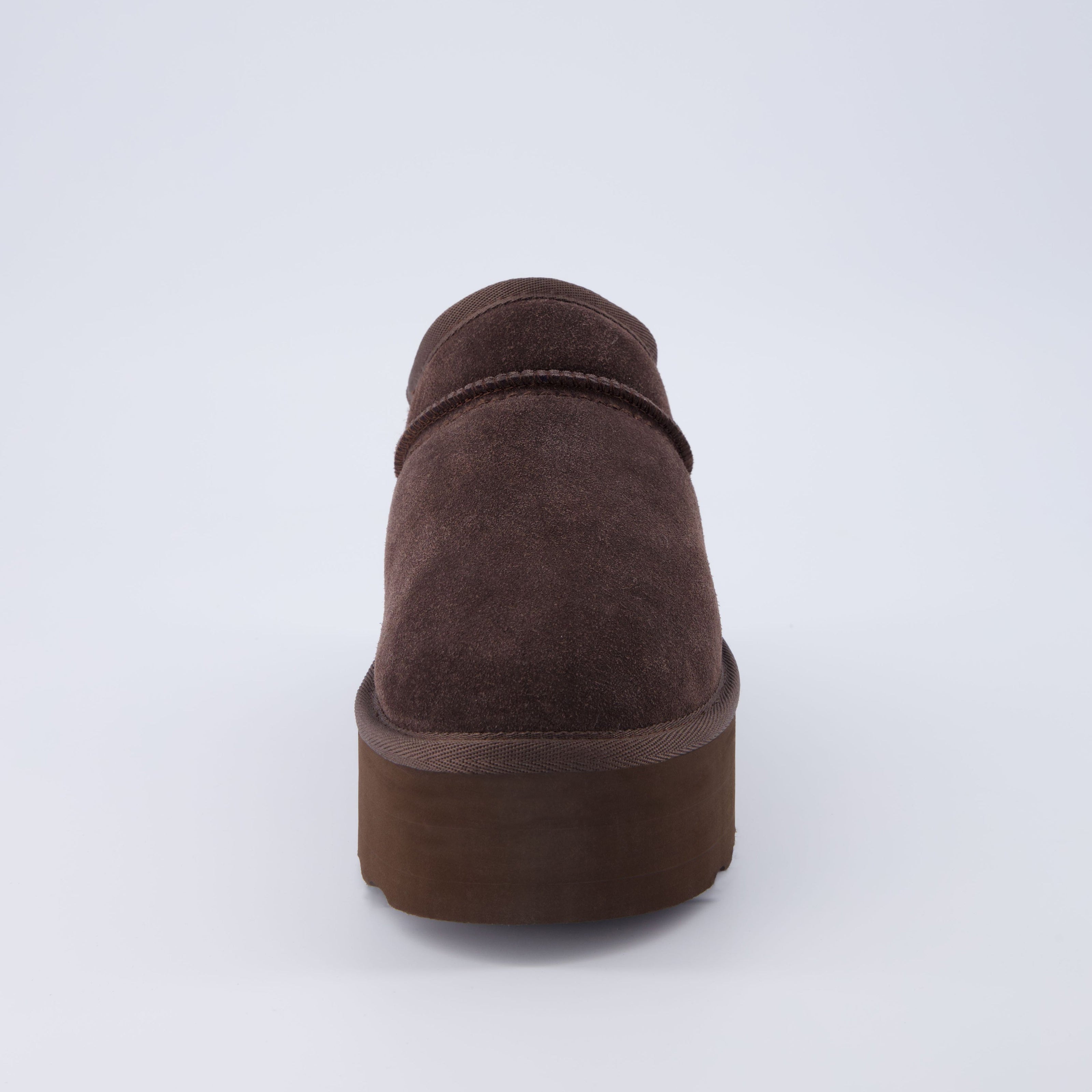Huggy Shearling Platform Clogs