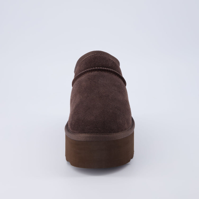 Huggy Shearling Platform Clogs