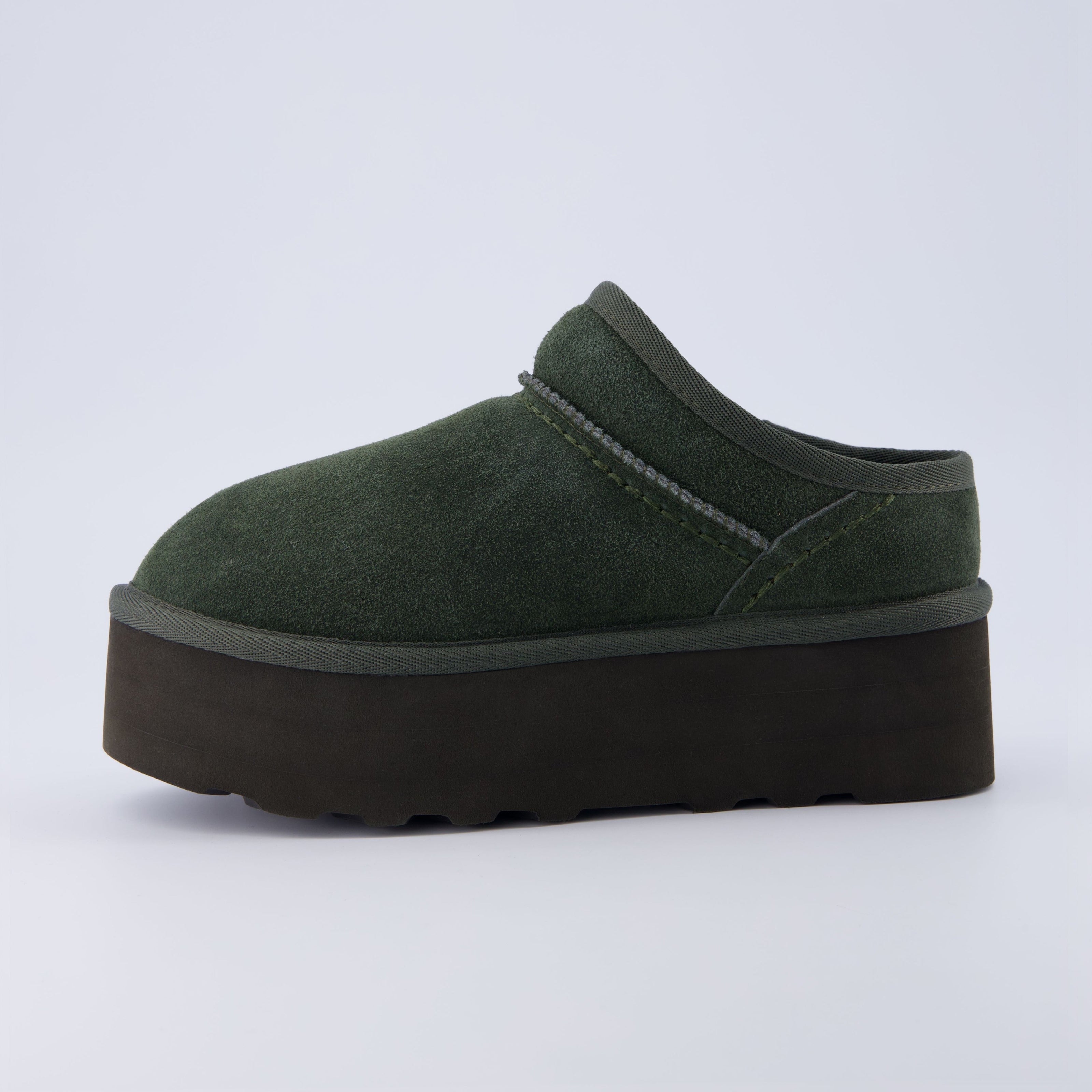 Huggy Shearling Platform Clogs