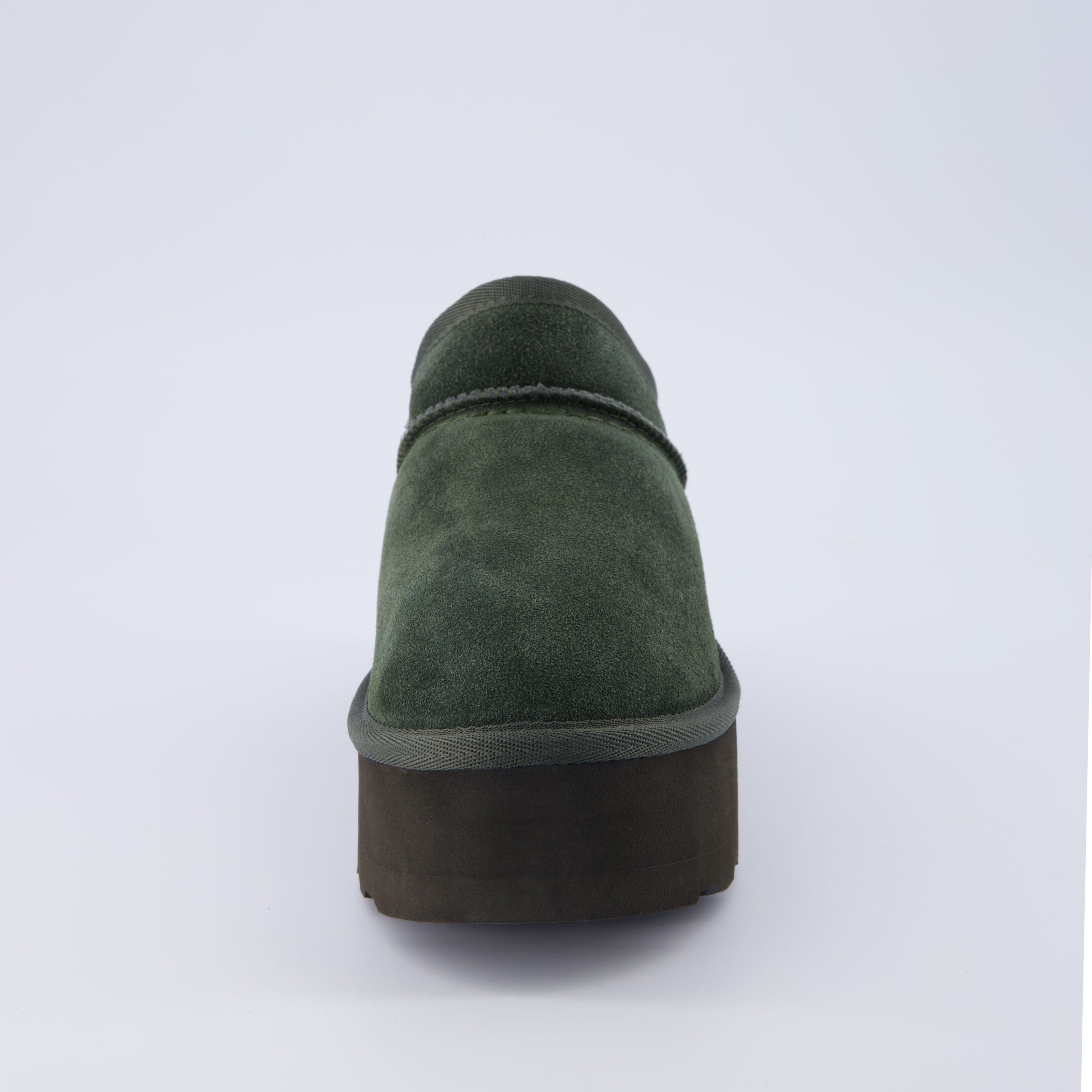 Huggy Shearling Platform Clogs