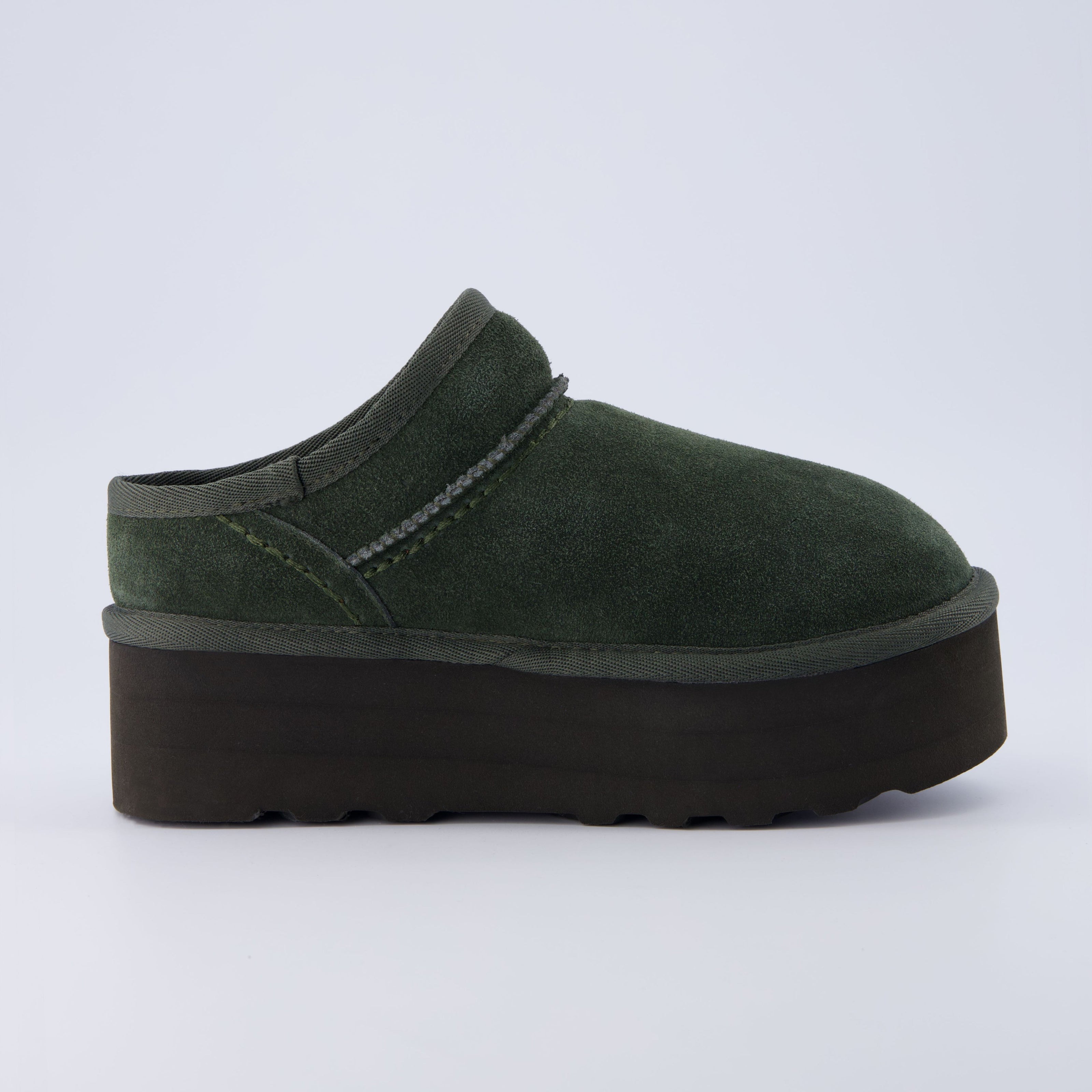 Huggy Shearling Platform Clogs