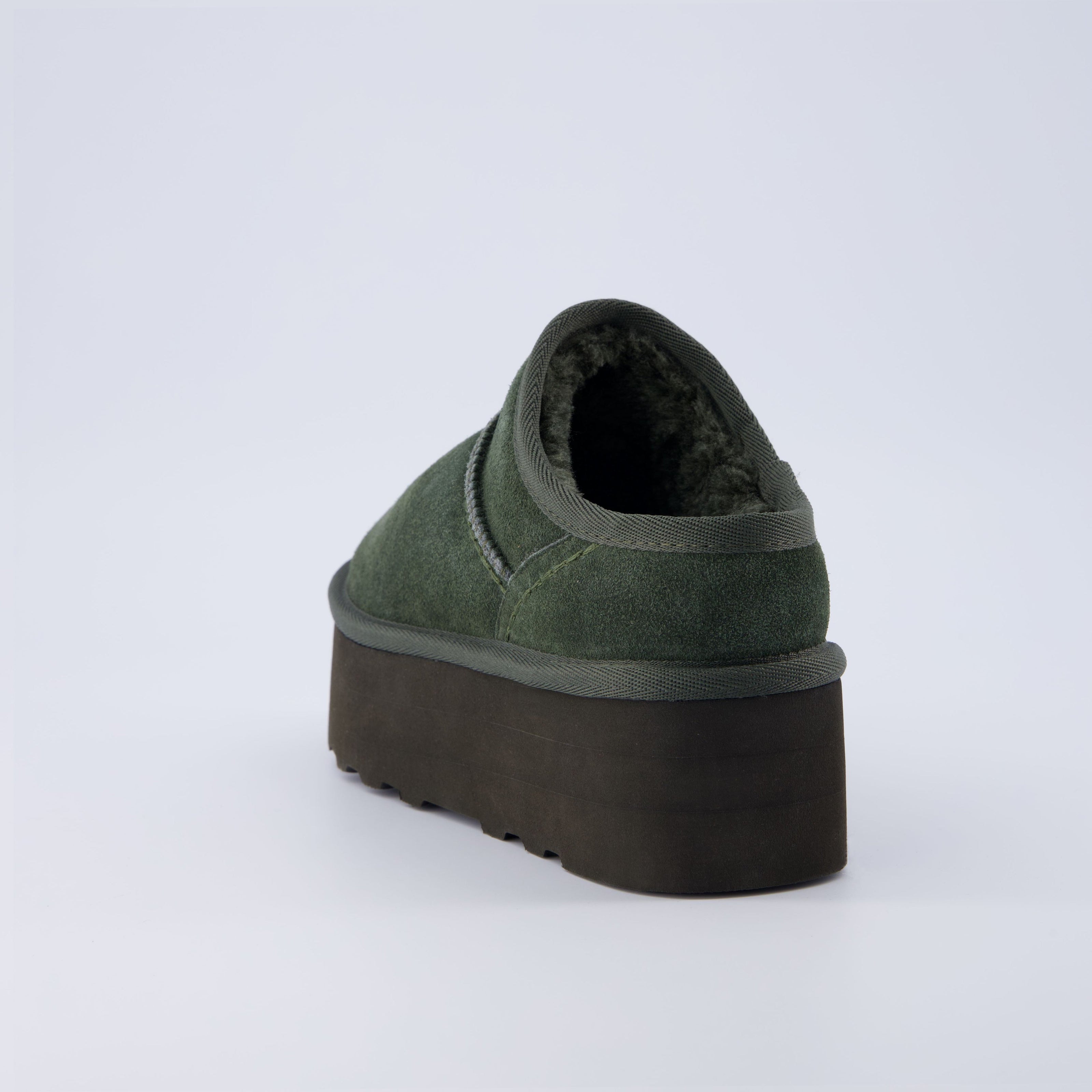 Huggy Shearling Platform Clogs