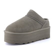 Huggy Shearling Platform Clogs