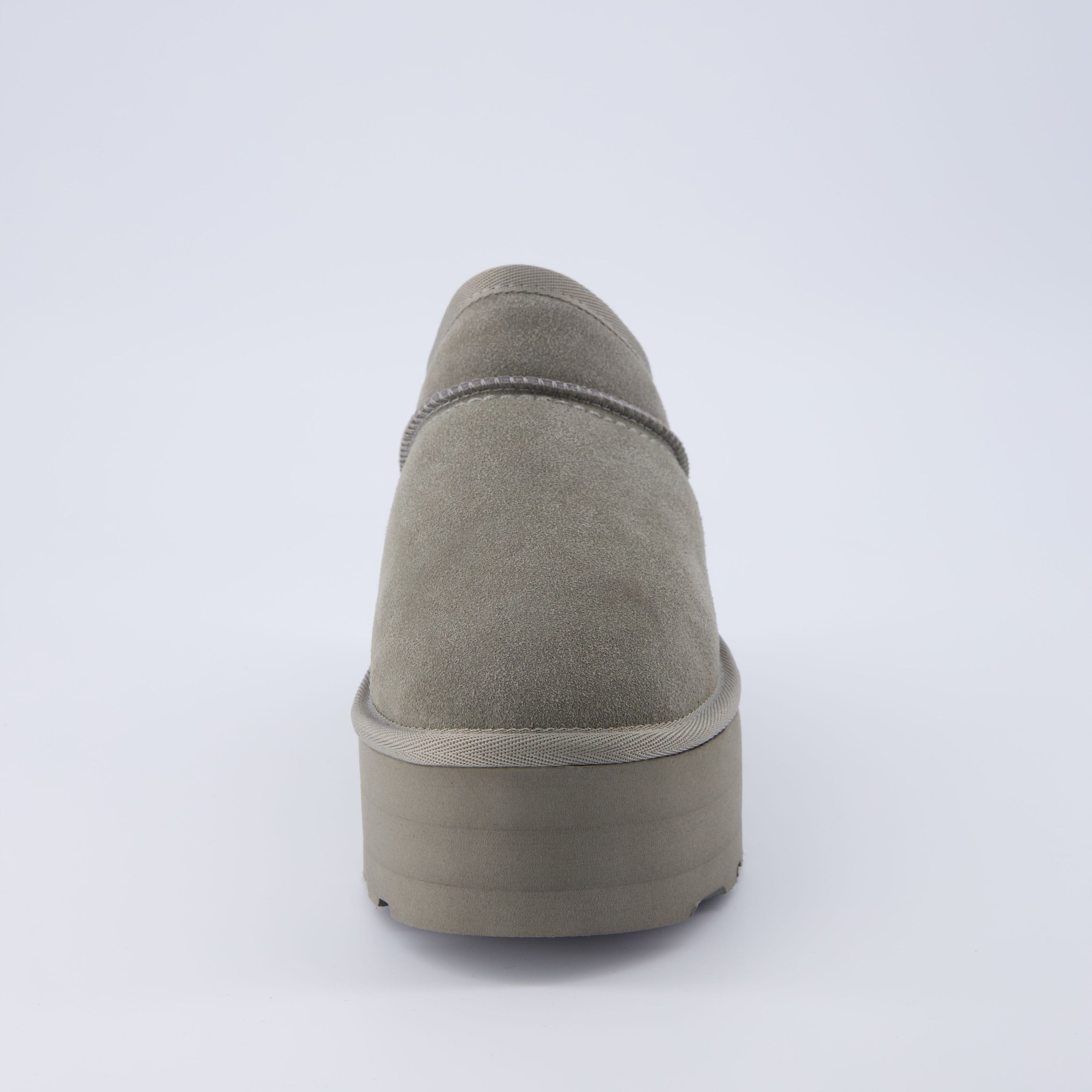 Huggy Shearling Platform Clogs
