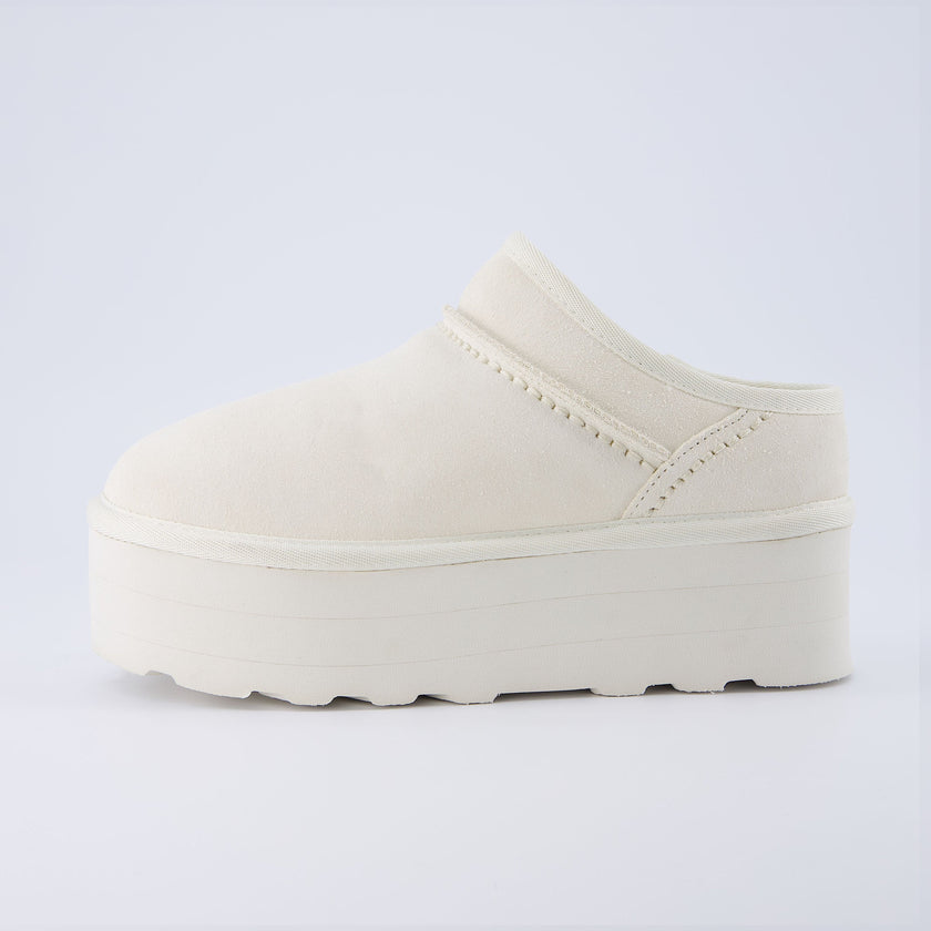 Huggy Shearling Platform Clogs