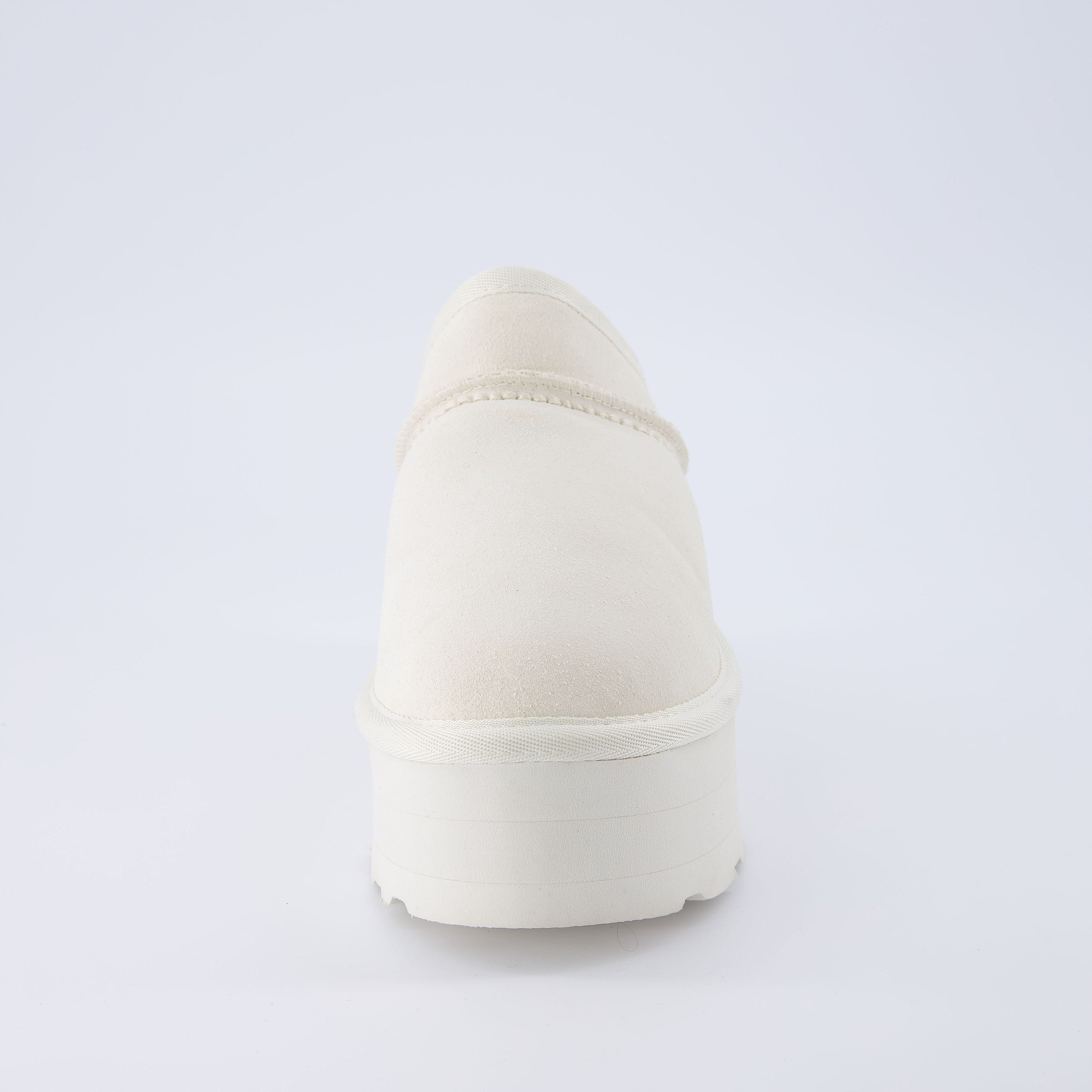 Huggy Shearling Platform Clogs