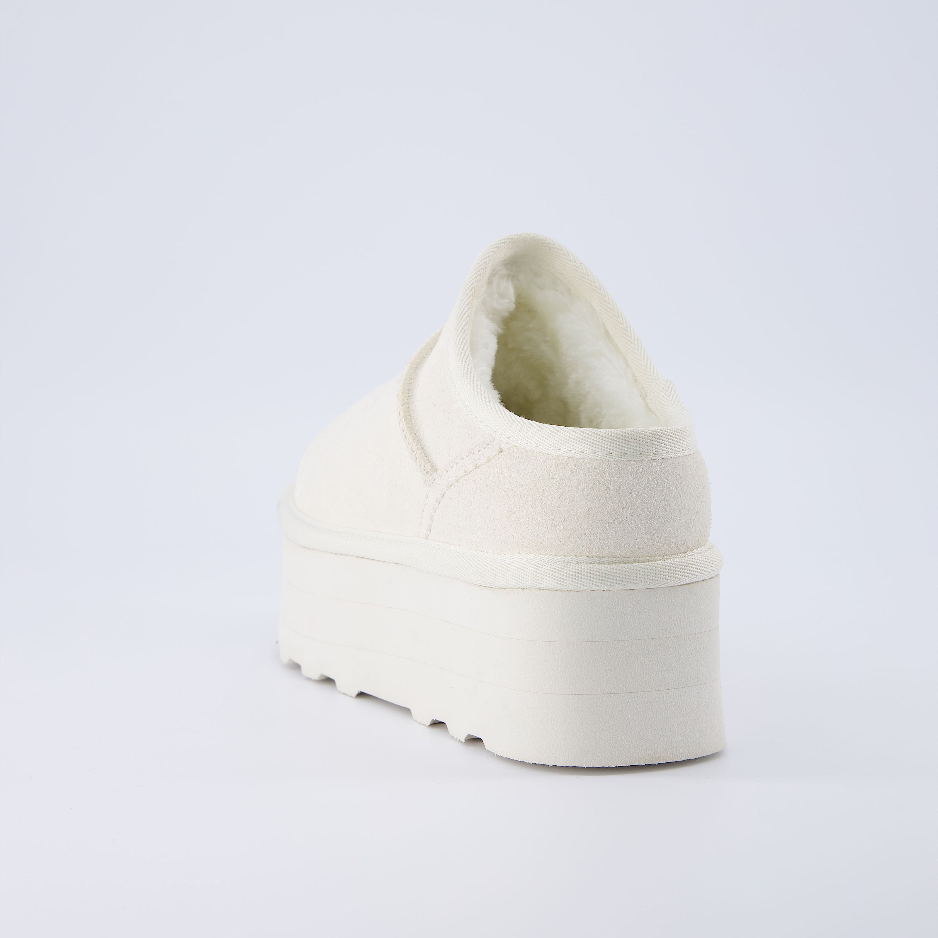 Huggy Shearling Platform Clogs