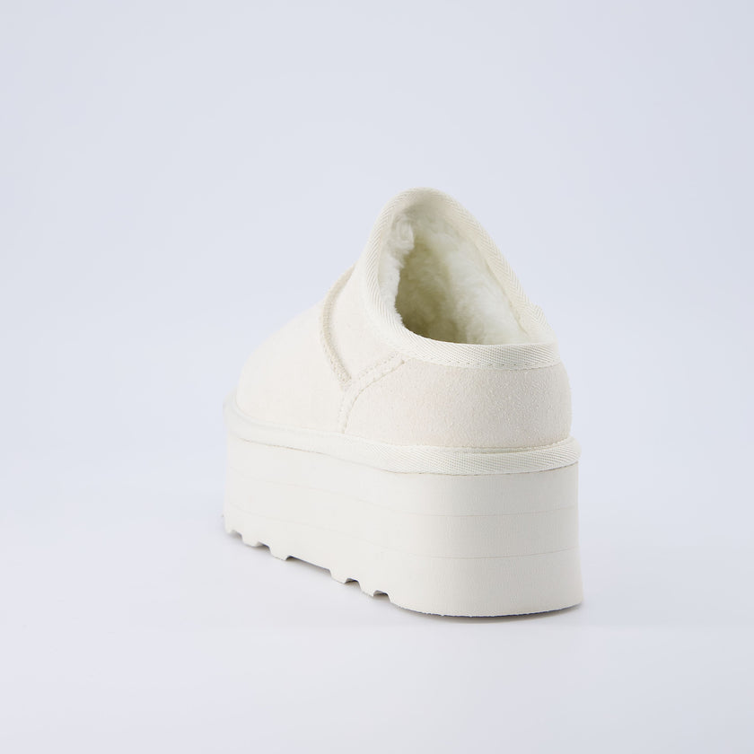 Huggy Shearling Platform Clogs