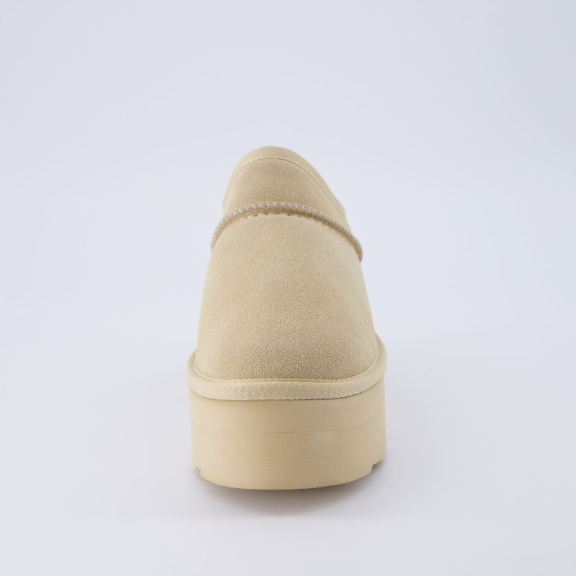 Huggy Shearling Platform Clogs