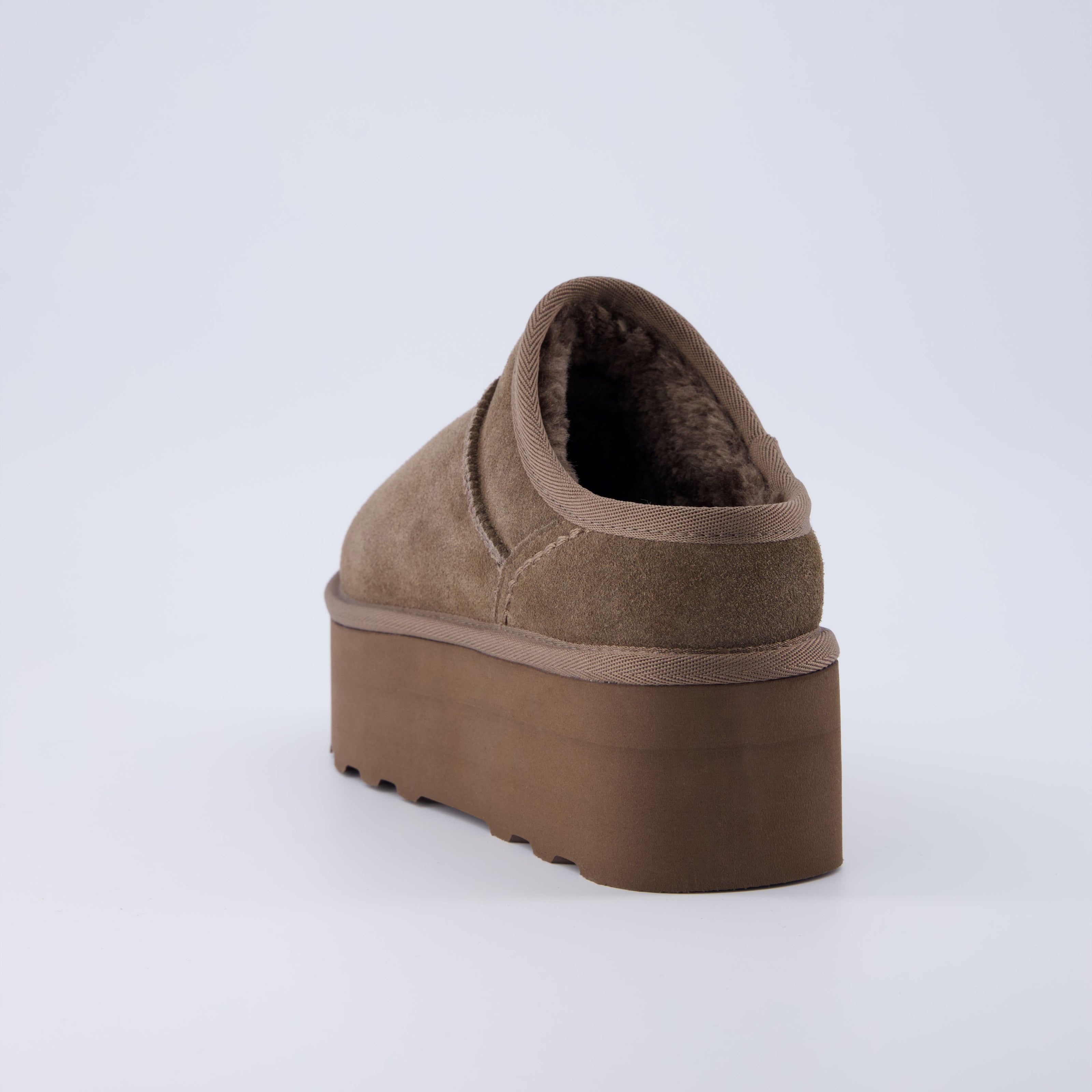 Huggy Shearling Platform Clogs