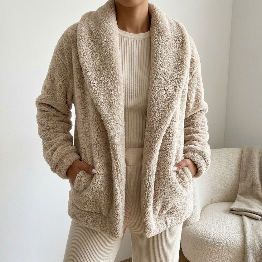 v2 Beige Isadora fluffy cardigan with hands in pockets