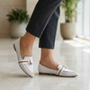Pointed toe slip-on loafers with knot detail
