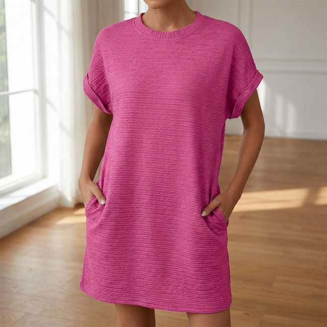T shirt dress for women with pockets worn in a bright minimal room