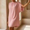 Mock neck midi dress for women with batwing split sleeves in a warm interior