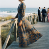 A-line V-neck maxi dress for women on a boardwalk at a coastal wedding in late afternoon