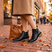Side zip comfort booties on a brick sidewalk in fall