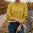 Lorie knit pullover sweater with jeans on a country lane