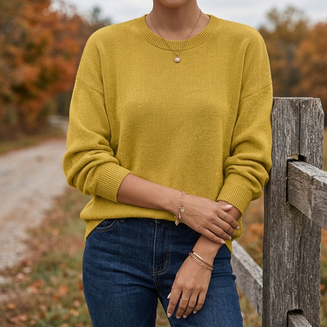 Lorie knit pullover sweater with jeans on a country lane