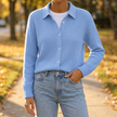 Lisa button-up knit cardigan sweater worn on an autumn sidewalk