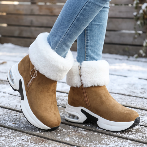 camel fur lined winter ankle boots for women on a snowy deck