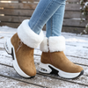 camel fur lined winter ankle boots for women on a snowy deck