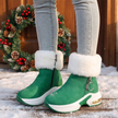green fur lined winter ankle boots for women on a holiday porch