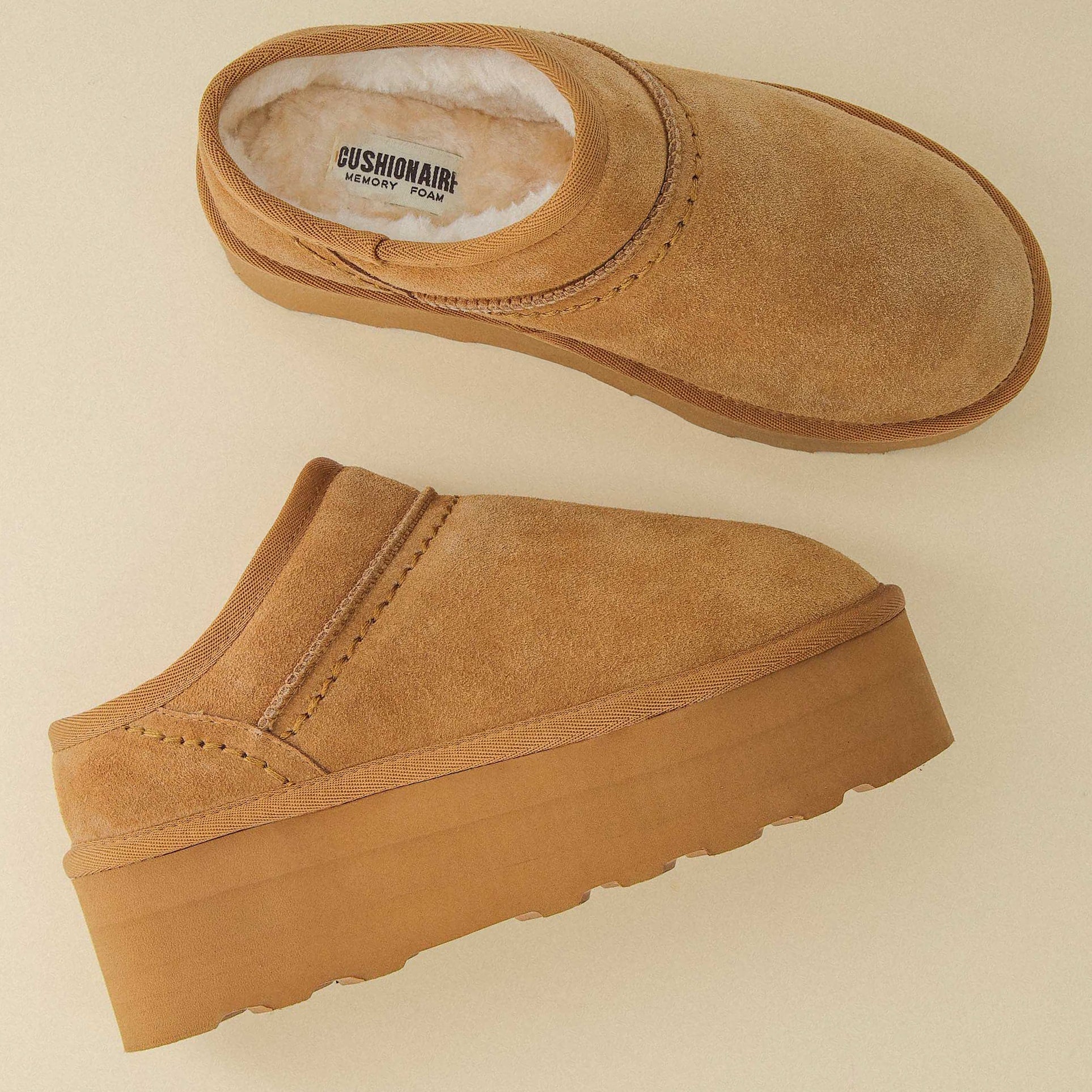 Huggy Shearling Platform Clogs