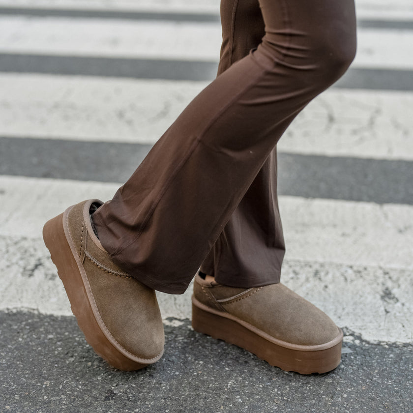 Huggy Shearling Platform Clogs