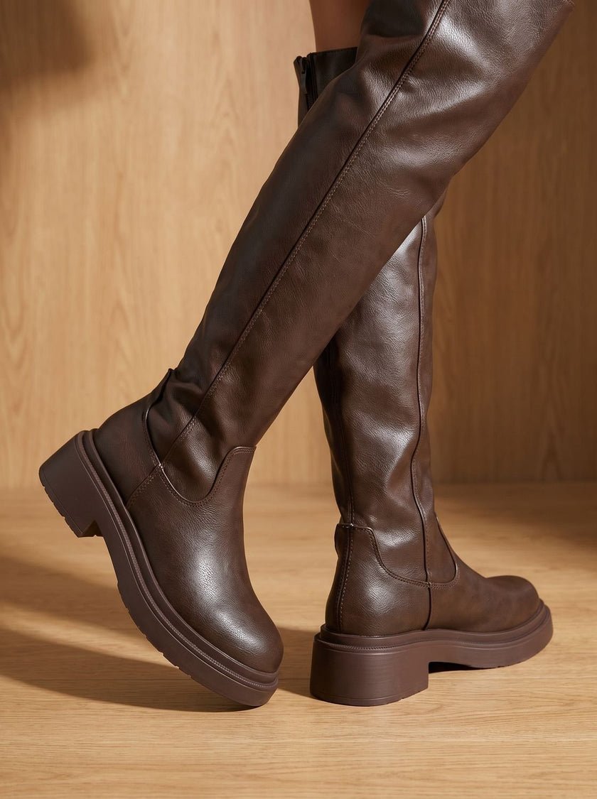 Over the knee boots, side view