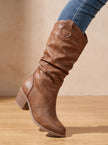 Knee high boots, side view